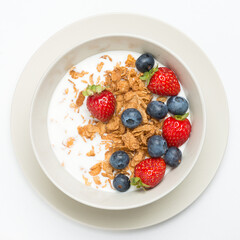 Cereal bowl with fruit healhy breakfast isolated on white
