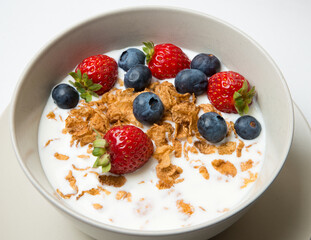 Cereal bowl with fruit healhy breakfast isolated on white