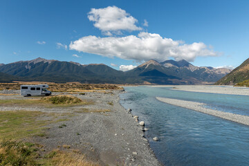 Motorhome parked next to riverside