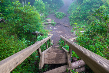 Fototapeta premium 大分県玖珠郡九重町、竹田市久住町のくじゅう連山を登山している風景 A scene of climbing the Kujyu mountain range in Kusu-gun, Kokonoe-machi and Takeda-shi, Oita Prefecture. 