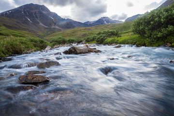 A stream flowing in the summer time in Gates of the Arctic National Park (Alaska), the least visited national park in the United States.