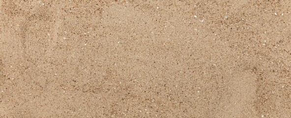 Panorama of Clean brown fine sand for use as a background