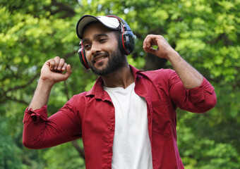 Man listening podcast using headphone