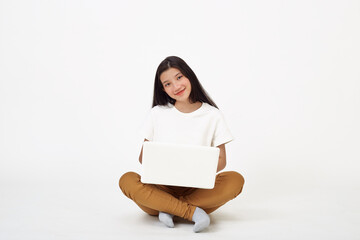 woman attractive sitting on the floor using laptop