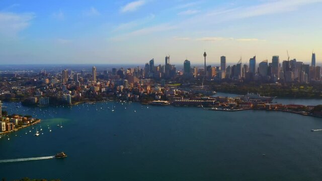 Aerial View of Sydney CBD Highrise Buildings, Potts Point and Ferry Ship Sailing in Midday - Sydney NSW Australia