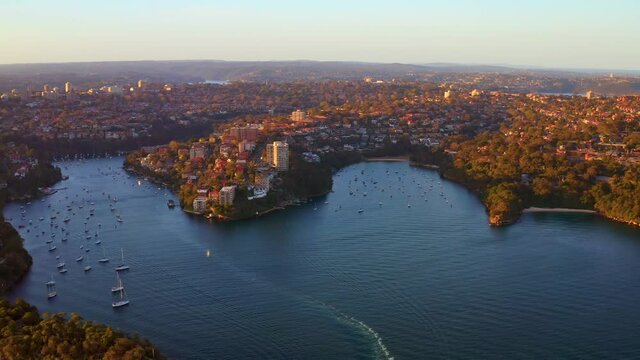 Aerial View of Port Jackson Bay in Sydney Harbour with Cremorne Point and Taronga during Sunset