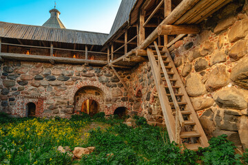 Obraz premium View of the galleries of the Kvasovarenaya Tower and the Kvasovarenie Gate in the wall of the Spaso-Preobrazhensky Solovetsky Monastery, Solovetsky Island, Arkhangelsk Region, Russia
