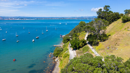 Aerial View from Houses close to the Beach, Green Trees, Mountain, Mount Maunganui, Boats in Tauranga, New Zealand  - Bay of Plenty