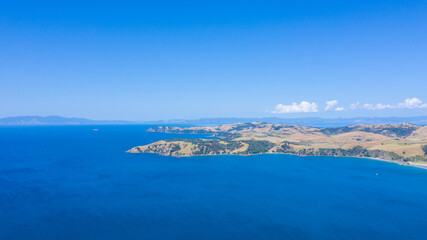 Aerial View from Ocean, Beach, Green Trees and Mountains in Waiheke Island, New Zealand - Auckland Area