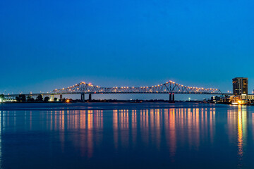 New Orleans, LA, USA - 08.05.2021
- The Mississippi River as it passes through New Orleans, LA and the Crescent City Connection Bridge 