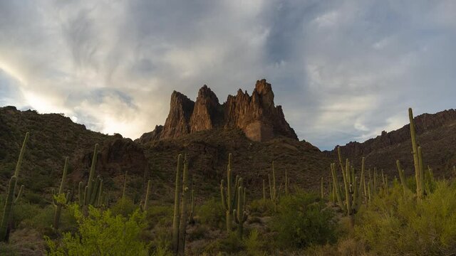 Cloud movement over the Sonoran desert in Arizona with saguaro cactus.