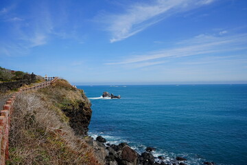 a beautiful seaside landscape with a walkway