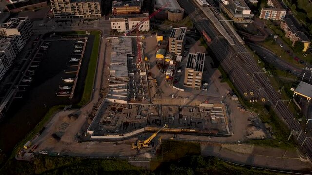 Kade Zuid luxury apartment complex construction at riverbank of river IJssel. Aerial blueprint view of new urban housing development project in former industrial area