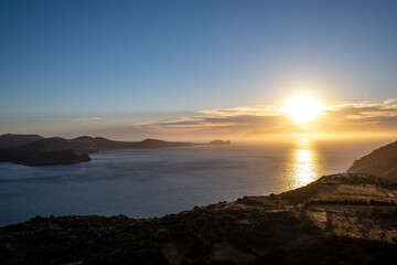 Sunset over Aegean sea at Milos island, Cyclades Greece.