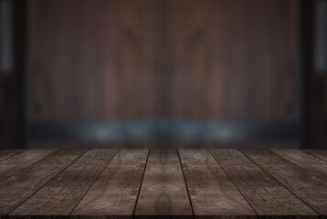 Empty wooden table top with lights bokeh on blur restaurant background.