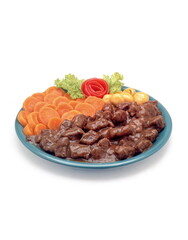 chopped fillet in sauce with vegetables on white background
