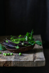 green peas on wooden