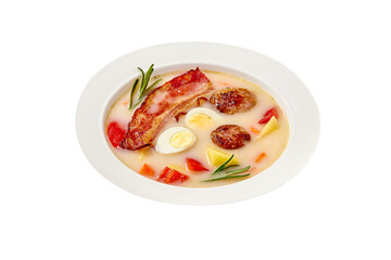 Polish soup zur with bacon, sausages and egg isolated on white