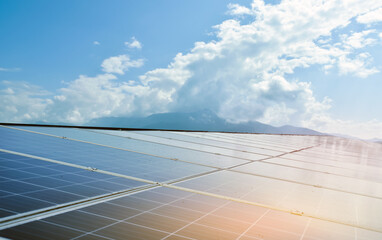 Photovoltaic rooftop of the buidlings, sunrise background, concept for environmental conservation...