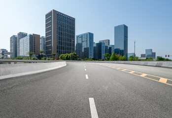 Fototapeta na wymiar Expressway background and urban skyline