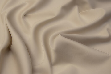 Plakat The texture of the synthetic fabric is light brown. Background, pattern.