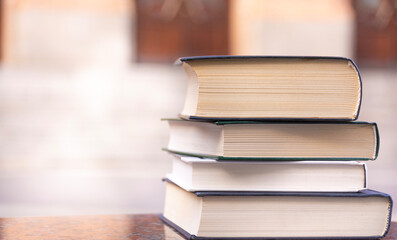 Stack of books in the background of the university.