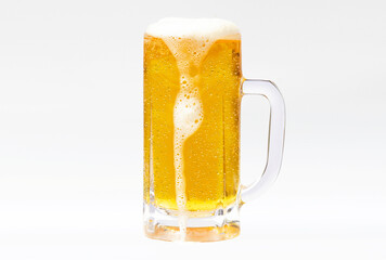 Image of a mug of beer with dripping foam and water droplets.