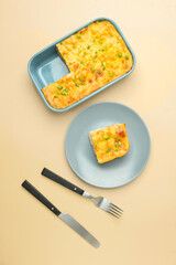Composition with mashed potato casserole on color background