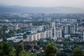 Fototapeta na wymiar Almaty, Kazakhstan - July 2 2021: Evening view of the city of Almaty