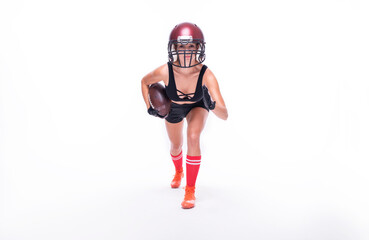 Woman in the uniform of an American football team player posing on a white background. Sports...