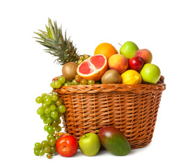 Basket with fresh fruits on white background