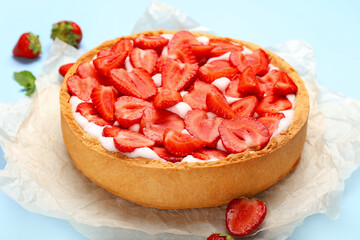 Tasty strawberry pie on color background