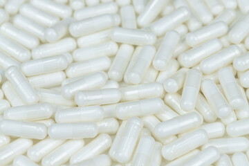 Medicine background of white capsules	