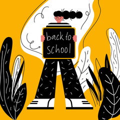 Young girl holding blackboard in her hands against the background of the leaves and grass. Education Concept. Back to school. 1 September. Education day. School girl, girl college or student