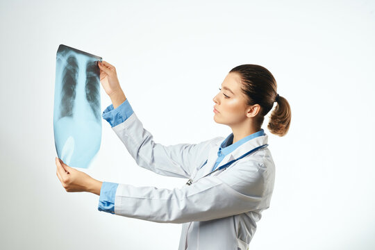 nurse white coat x-ray diagnostics hospital light background