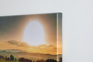 Canvas photo print with gallery wrap, edge closeup, interior decor. Landscape photography hanging...