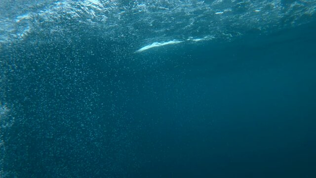 Sea underwater bubbles in slow motion as background