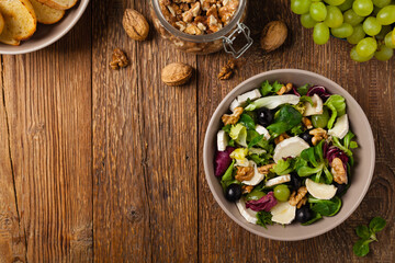 Italian spring salad with goat cheese, grapes and walnuts. Served with croutons.