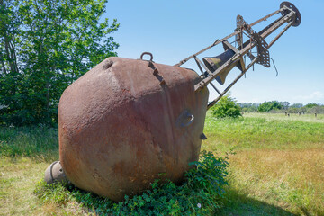 rundown metallic buoy