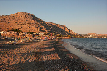 Golden Hour Scene with Sea Shore and Mountain in Greece. Greek Beach during Evening in Rhodes.