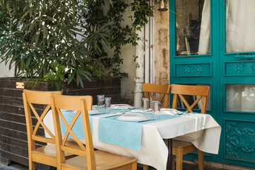 A table in a restaurant or a summer cafe on the sea coast of Antalya, Turkey. Place in a restaurant...