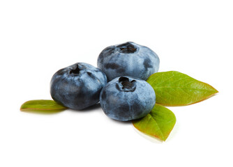Fresh blueberries (Cyanococcus within the genus Vaccinium) with green leaves isolated on white background. 