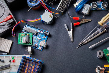 electronic board and tools repairs on black background