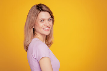 Obraz premium Portrait of lovely cheerful lady shiny white smile good mood concept on yellow background