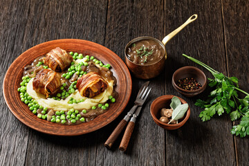 english meatballs, faggots with potatoes and peas