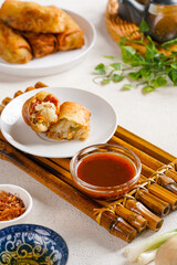 Lumpia or popiah are made of thin paper-like or crepe-like pastry skin called 
