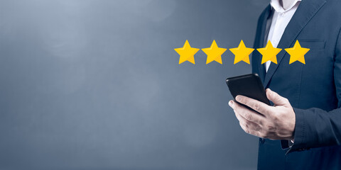 Five stars 5 rating with businessman touching screen, concept about positive customer feedback and review, excellent performance. banner, copy space.