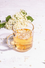 Elderberry flower tea. Refreshing summer drink, healthy lifestyle concept