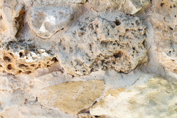 Textura de piedra rugosa, caliza. Vista de frente y de cerca