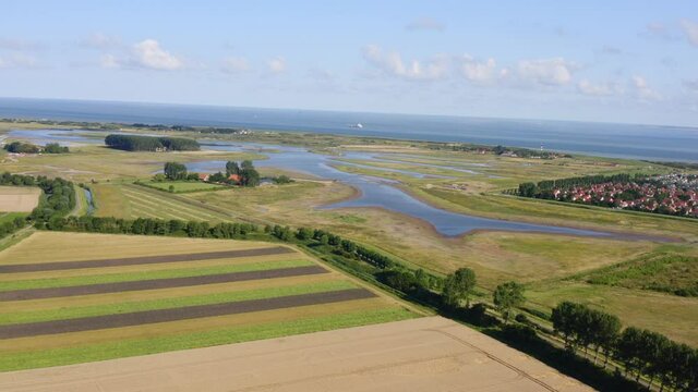 Aerial wide shot of a surroundings of Waterdunes - a nature area and recreational park in the province of Zeeland, The Netherlands